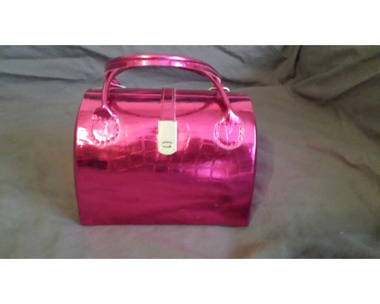 Boîte à bijoux rose en forme de sac à main